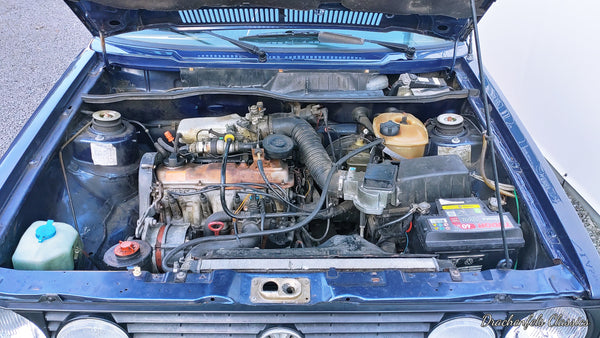 VW Golf I Cabriolet (155 2H) (1990).